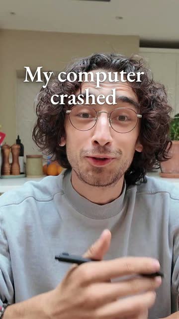 A hook headline running across his forehead and glasses