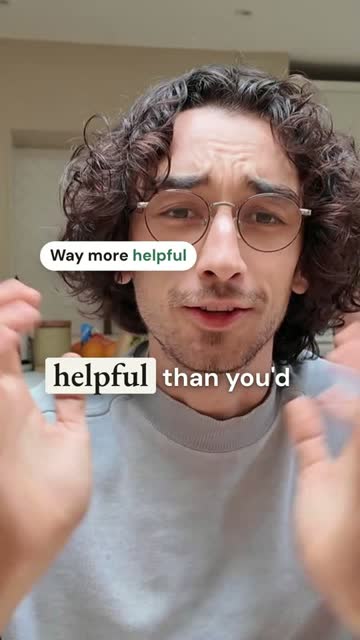 A pill reading Way more helpful sitting on his cheek