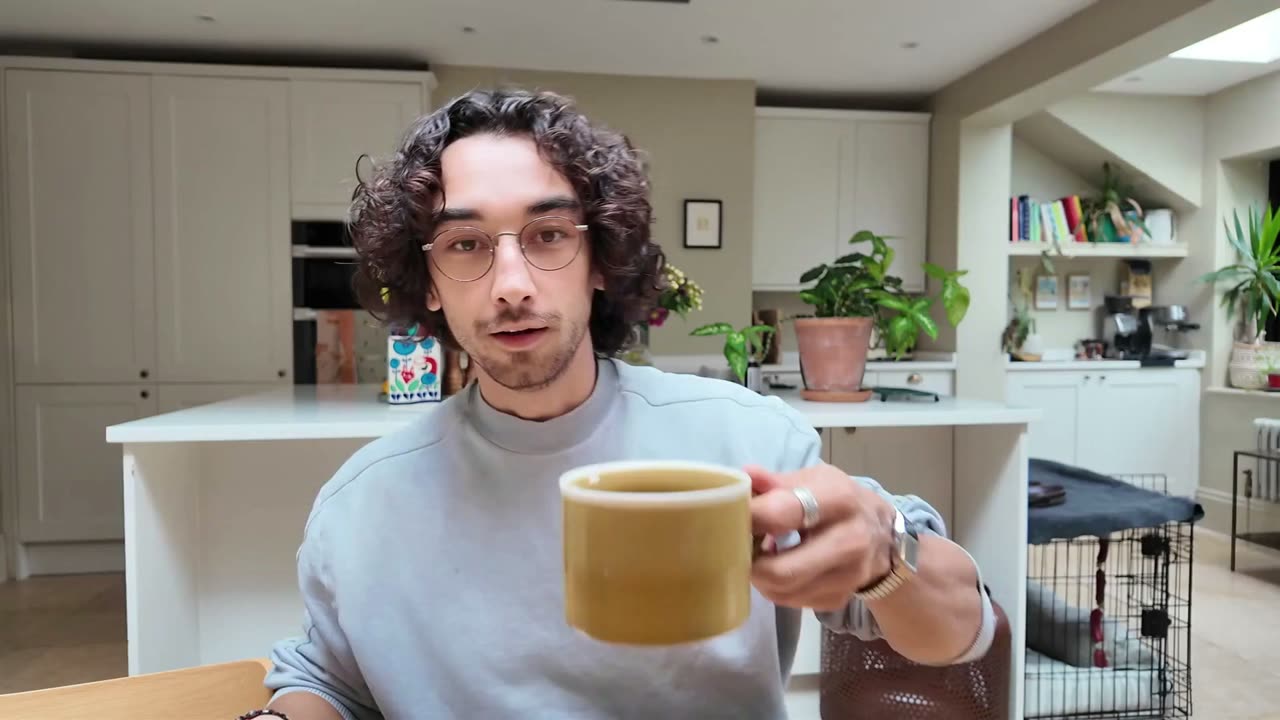Elliott Tong at his kitchen table, recording the Weekly Board Meeting.
